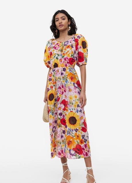 Vestido midi con floral print y detalles de aberturas