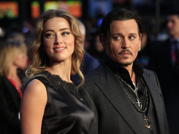 Amber Heard y Johnny Depp en una de sus últimas apariciones juntos antes de anunciar su divorcio./cordon press.