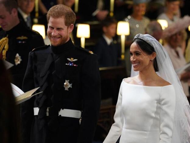 Harry de Inglaterra y Meghan Markle instantes después de intercambiar sus alianzas y ser declarados marido y mujer./getty