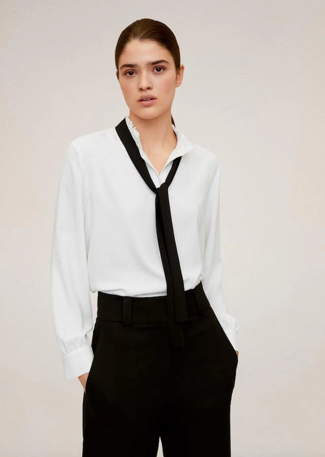 Fotos: Las blusas blancas perfectas para cualquier estilo que todavía puedes comprar rebajadas Mango por menos 20 | Mujer Hoy