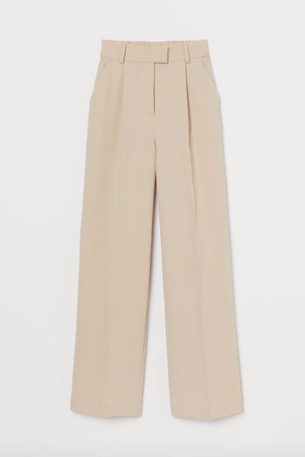 Pantalones con la pernera ancha y talle alto de H&M.