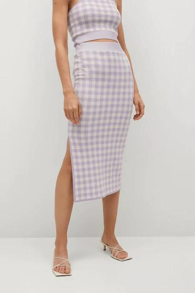 Las faldas midi de la nueva colección de Mango tienen los diseños estilizan y que más veremos esta primavera | Mujer Hoy