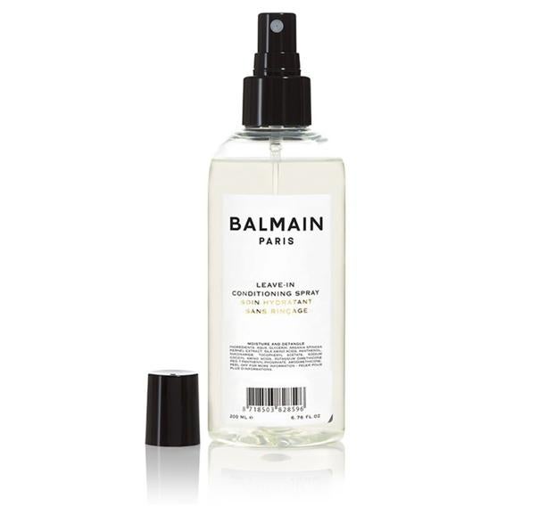 Leave-In Conditioning Spray de Balmain es un acondicionador sin aclarado a base de proteínas de seda y aceite de argán. Ideal para refrescar el cabello rizado en cualquier momento del día (33 euros).