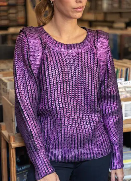 Nuria Roca o cómo combinar un jersey fucsia para construir un look de  oficina de sobresaliente