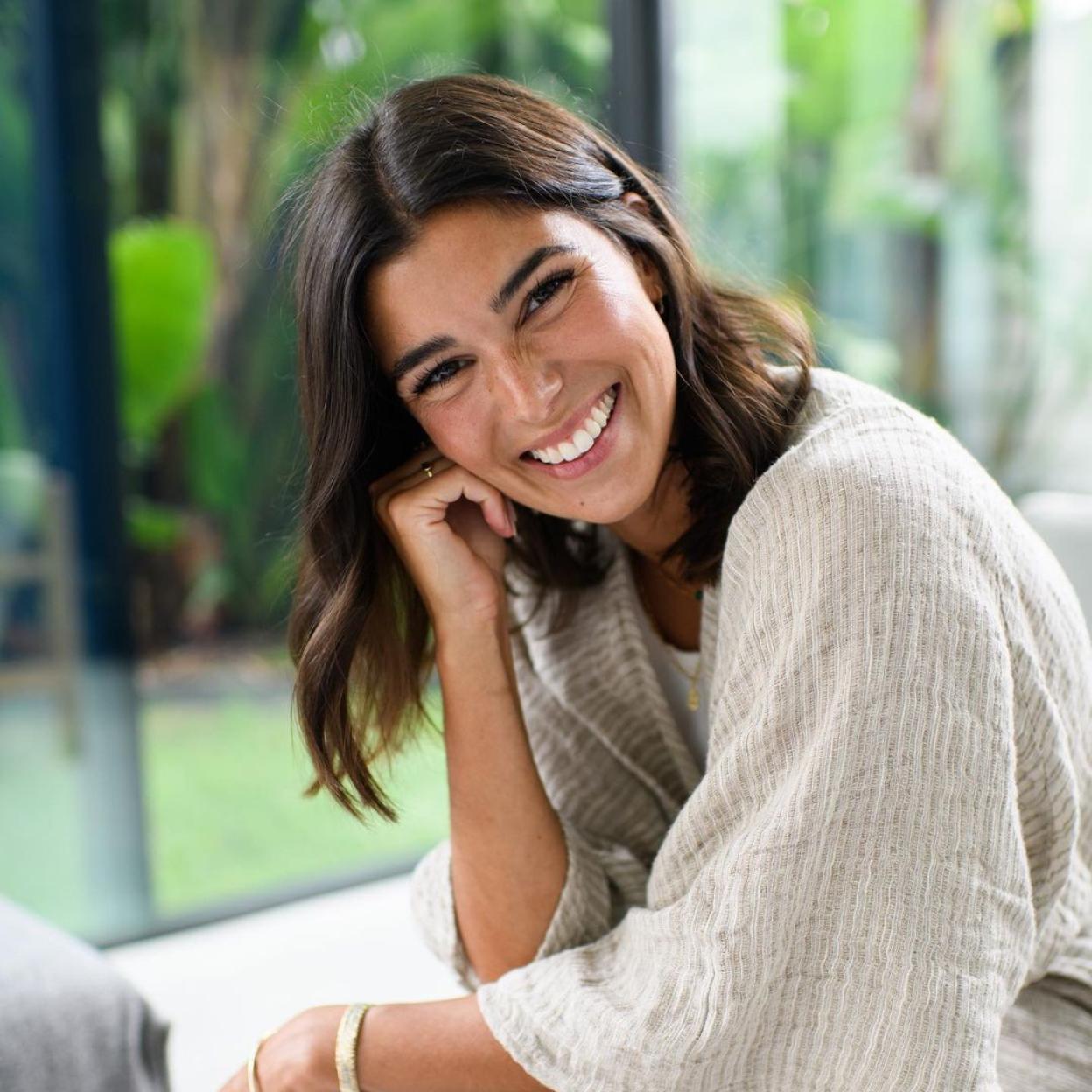 Una influencer con el pelo castaño./@biancamelas