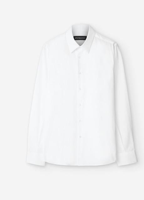 Camisa blanca estructurada de Adolfo Domínguez, 69,95 euros.