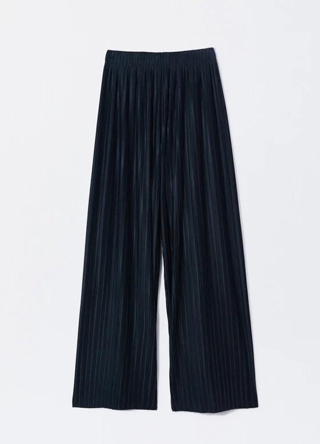 Pantalones plisados en azul de Parfois (32,99 euros). Foto: Parfois.