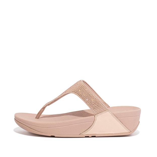 Sandalias de FitFlop en oro rosa.