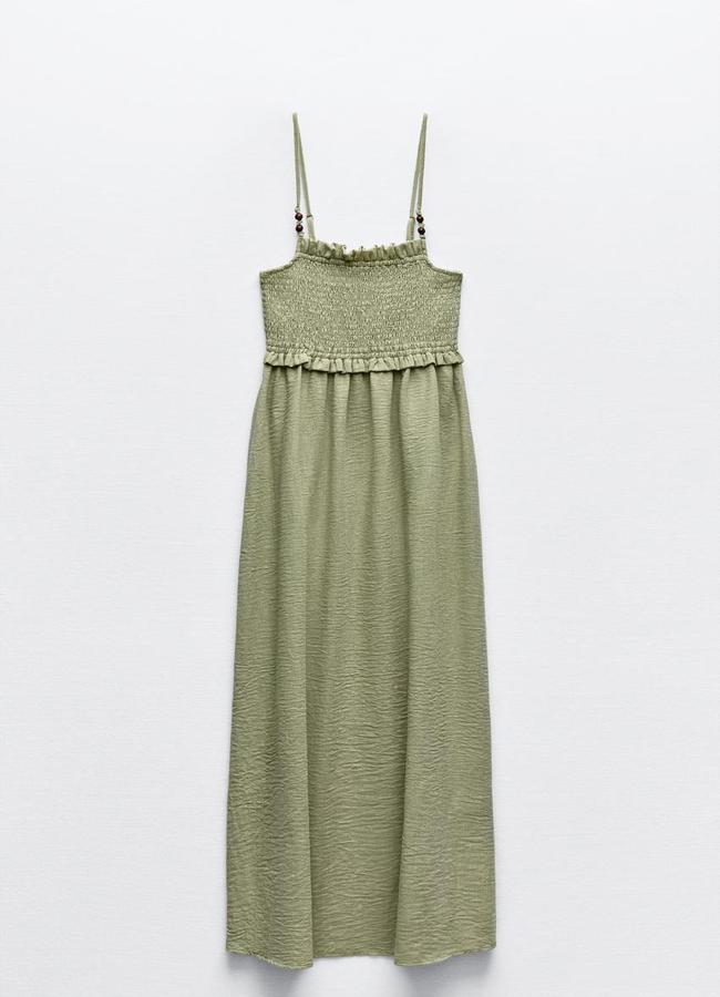 Vestido nido de abeja en verde de Zara.