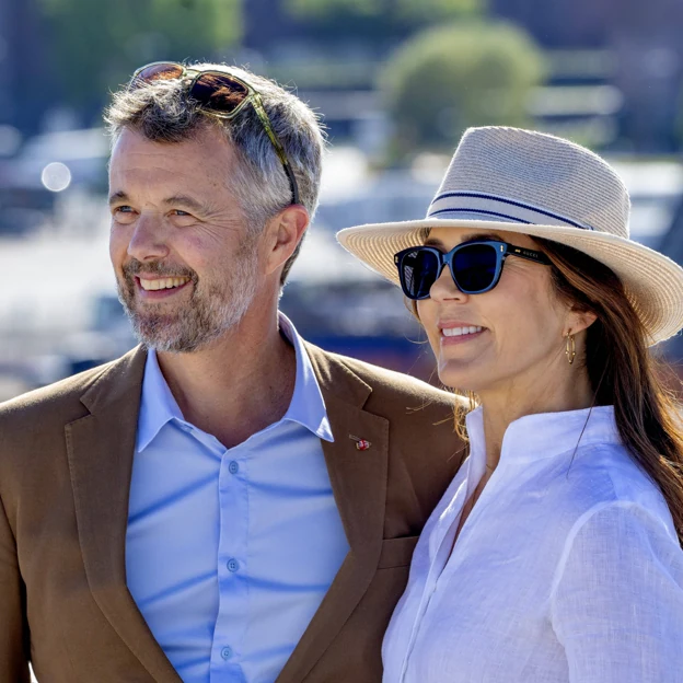 Frederik and Mary: smiling through tough times.