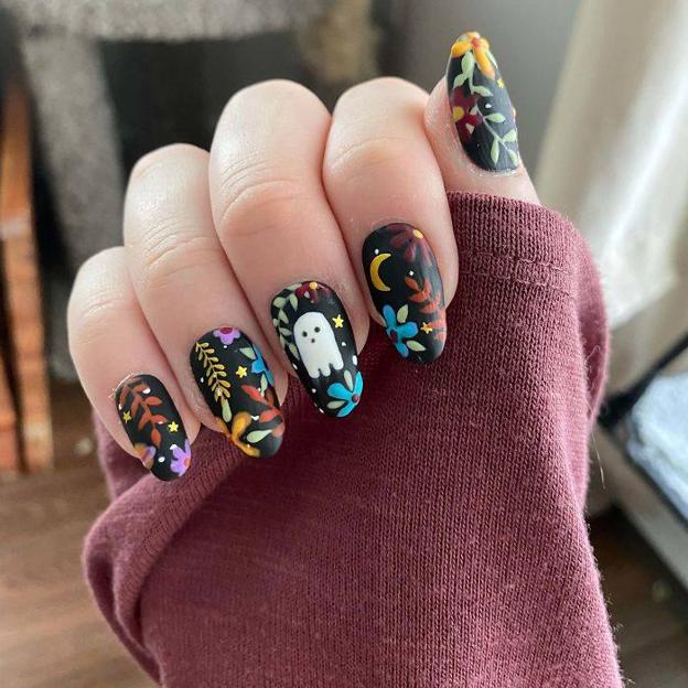 Uñas para Halloween con dibujos del día de muertos