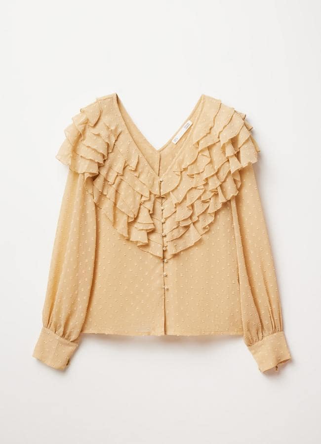 Blusa con plumeti de Sfera, 25,99 euros.