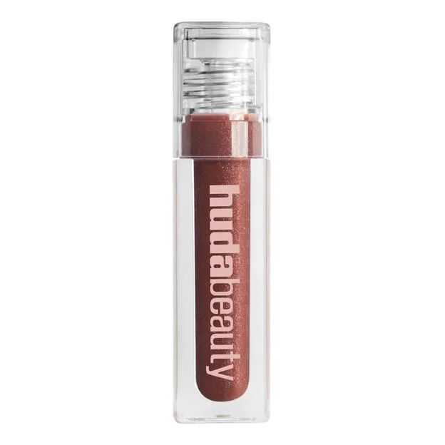 Icy Nude FAUX FILLER Lip Gloss en tono She Fire de Huda Beauty