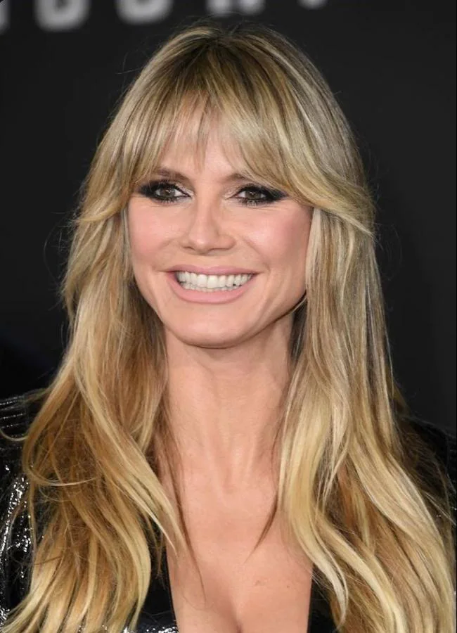 Heidi Klum con flequillo cortina tupido y pelo largo/@heidiklumly