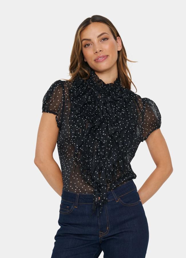 Blusa de lunares con pechera de volantes