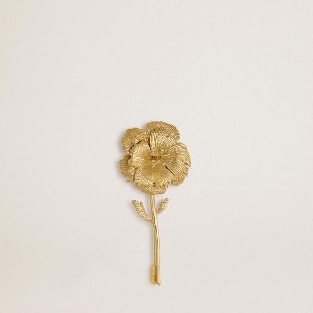 Broche con forma de flor en dorado de Golden Goose.