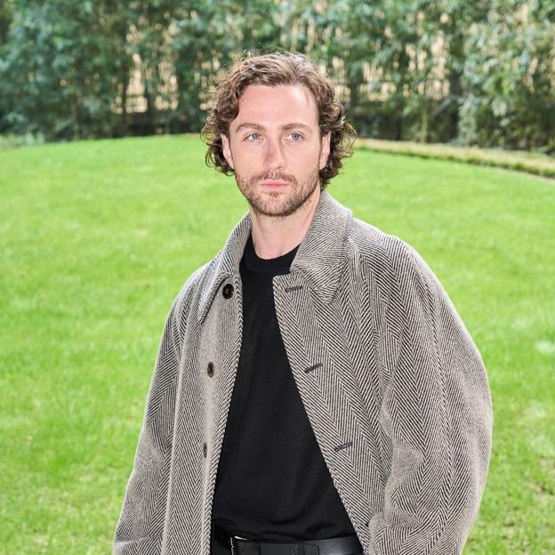 Aaron Taylor-Johnson en desfile de la Semana de la Moda